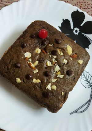 A picture of Dates and Dry Fruits Chocolate Cake.