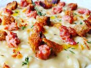 Una foto di risotto allo scalogno