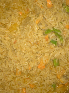 A picture of Vegetable Coconut rice and fish.
