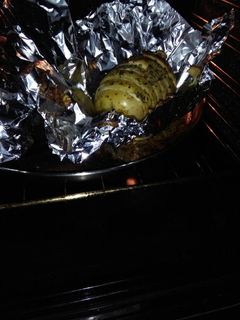 Una foto de Patatas rellenas de queso al horno