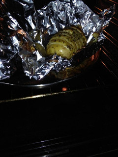Una foto de Patatas rellenas de queso al horno