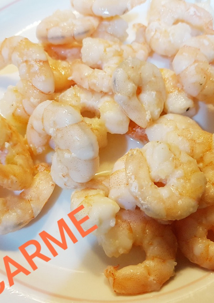 Una foto de Colas de langostinos salteados