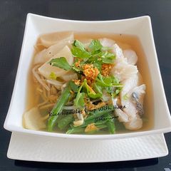 A picture of Rice Noodles Soup With Hake.
