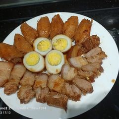 Braised Pork Belly, Chicken Wings & Eggs Chinese Style A picture of Braised Pork Belly, Chicken Wings & Eggs Chinese Style.