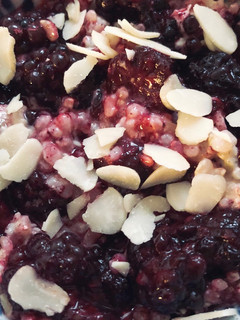 A picture of Blackberry and cardamom rice pudding - vegan.