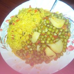 A picture of Tumeric rice and peas.