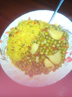 A picture of Tumeric rice and peas.