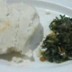 A picture of Sukuma served with ugali.