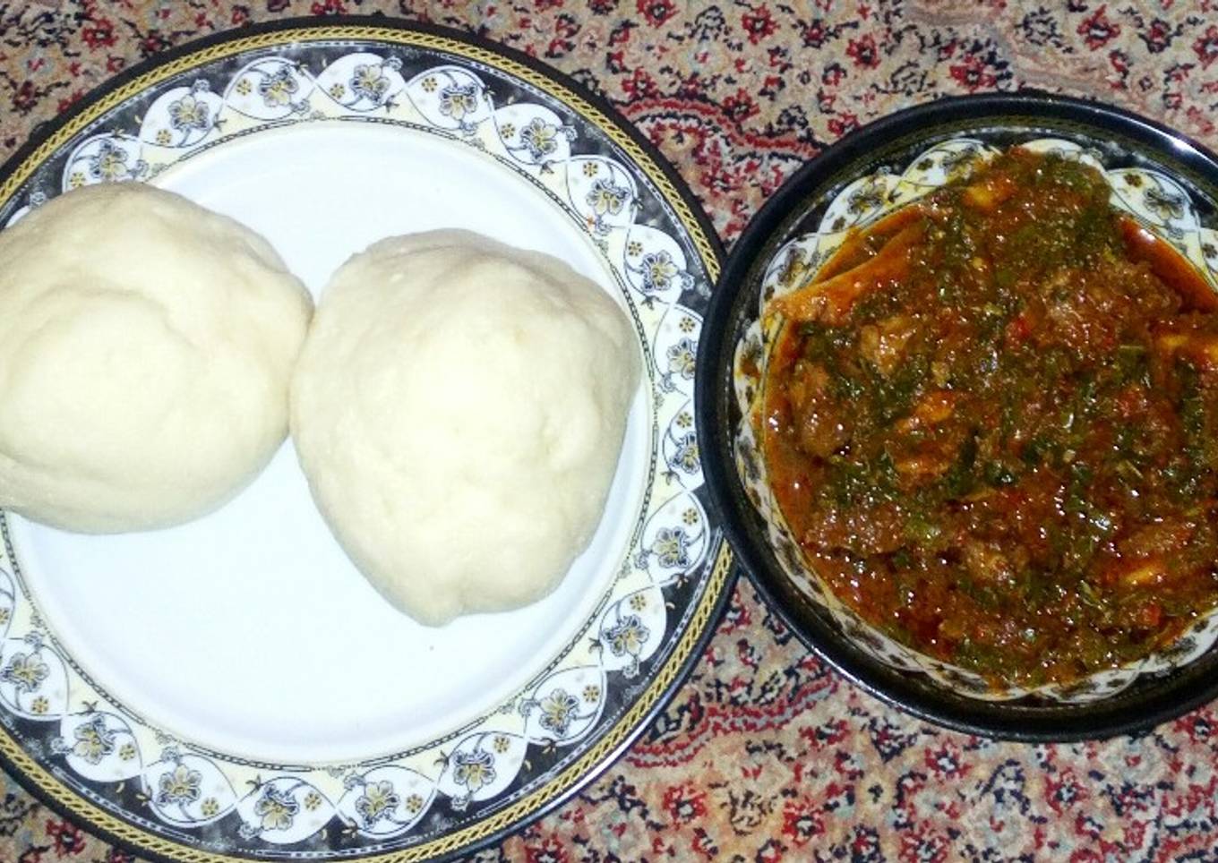 Pounded yam with pumpkin soup