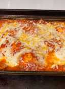 Bake ravioli with salad and cheesy bread