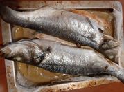 Una foto di pesce al forno