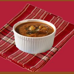 A picture of Ulli theeyal (Pearl Onion masala curry).