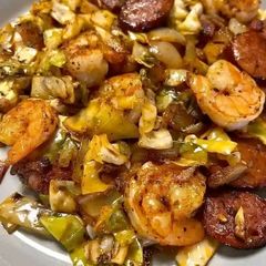 A picture of FRIED CABBAGE WITH SHRIMP, SAUSAGE & BACON.