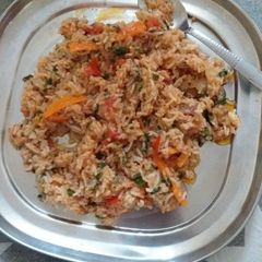 A picture of Fried rice with ketchup ka tadka.