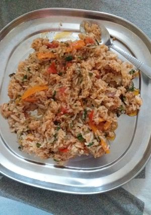 A picture of Fried rice with ketchup ka tadka.