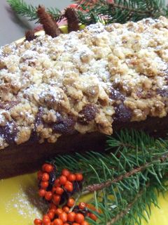 Una foto de Budín navideño crujiente con frutos secos y manzanas de invierno