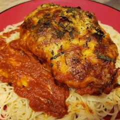 A picture of Pork Chop Parmesan.