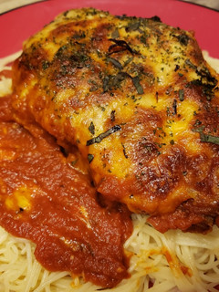 A picture of Pork Chop Parmesan.