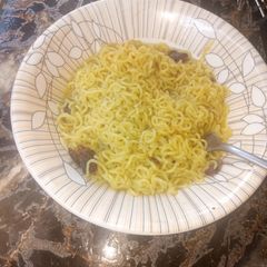 A picture of Indomie da soyayyen nama.
