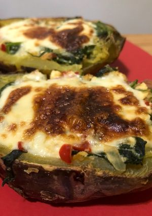 Una foto de Batata rellena con espinaca y ricota