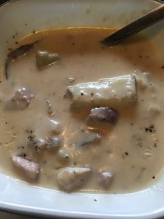 A picture of Creamed potatoes and ham.