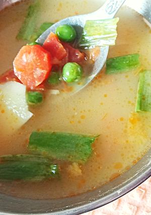 A picture of Veggies with Potato Soup.