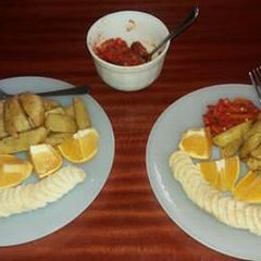 A picture of Dip fried potatoes and tomato chilly.