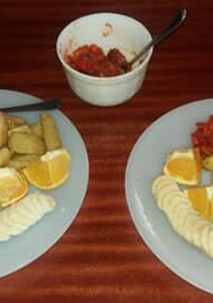 A picture of Dip fried potatoes and tomato chilly.