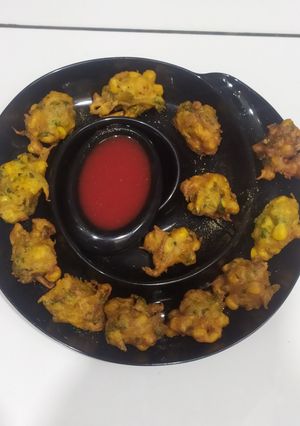 A picture of Crispy corn onion fritters.
