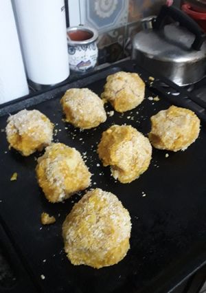 Una foto de Bombas de zapallo con queso