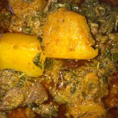 A picture of Garden-egg, pumpkin and spinach soup.