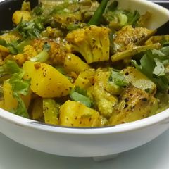 A picture of Phulkopir Data Chorchori/ Cauliflower Stalk Curry.