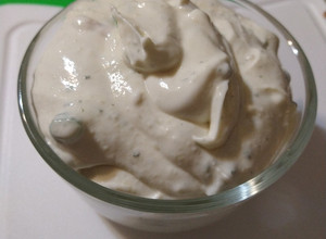 A picture of Whipped Roasted Garlic & Green Onion Protein Bagel Shmear.