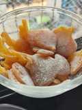 Orange candies in two varieties