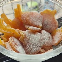 A picture of Orange candies in two varieties.