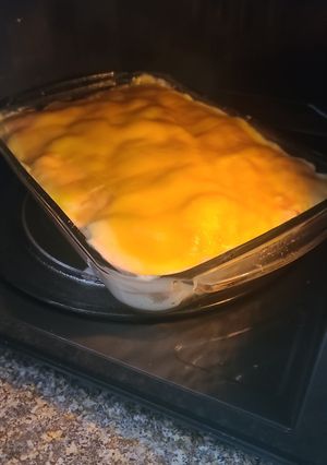 Una foto de Papas con jamón al horno