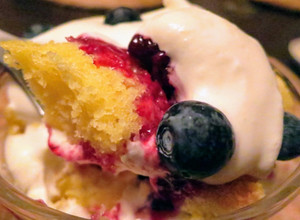 A picture of Lemon Cake Trifle with Berry Compote & Vanilla Mascarpone Whipped Cream.