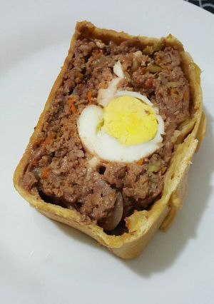 Una foto de Pan de carne en masa crocante
