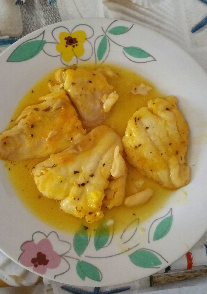 Una foto de Bacalao en salsa de naranja y albahaca