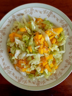 A picture of Mango lettuce salad.