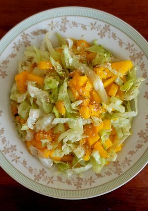 A picture of Mango lettuce salad.