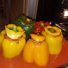 A picture of stuffed peppers .