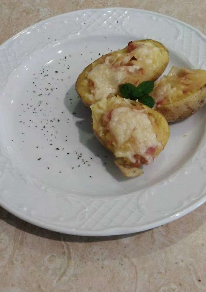 Una foto de Nidos de patatas con cebolla y bacon