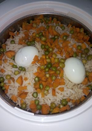 A picture of White rice with veggies.