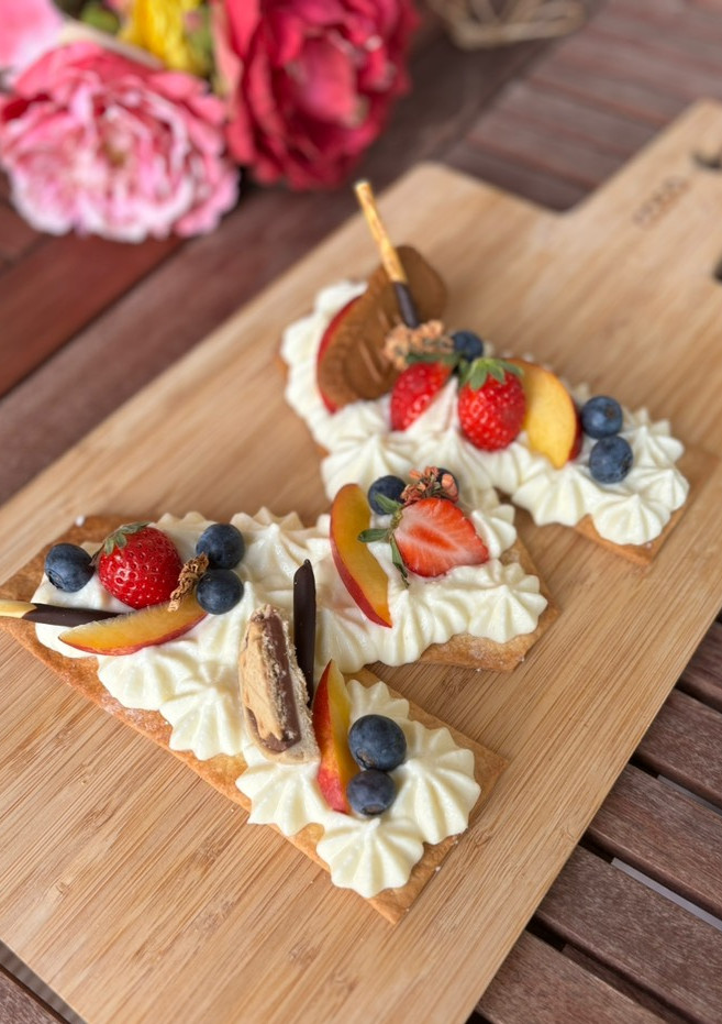 Una foto de Postre para el día de la madre - tarta de letras