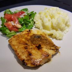 A picture of Miso and ginger salmon with cheesy mash.