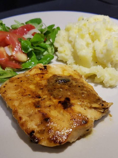 A picture of Miso and ginger salmon with cheesy mash.