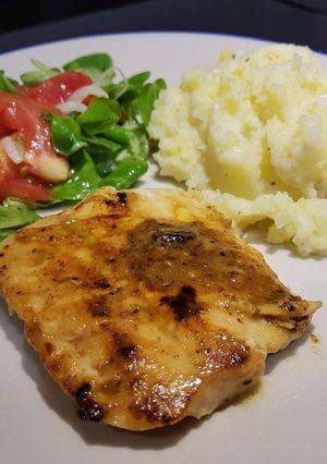 A picture of Miso and ginger salmon with cheesy mash.