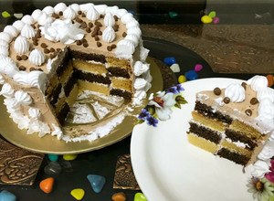 A picture of Chocolate mousse checker board cake.