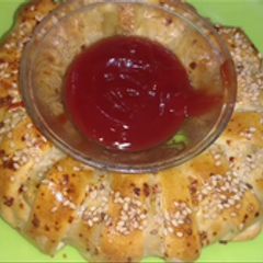 A picture of Chicken cheese bread.